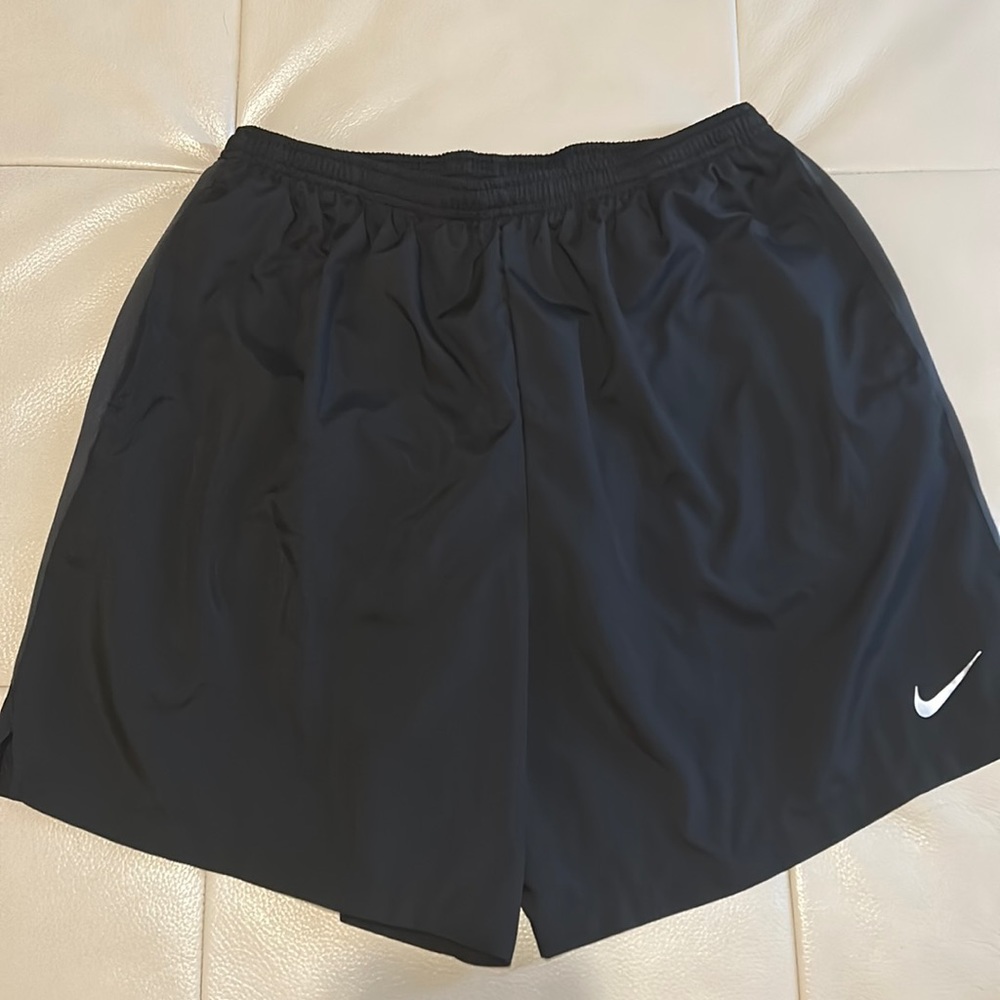 Nike dri-fit black shorts with drawstring/elastic waist. Built in undies.